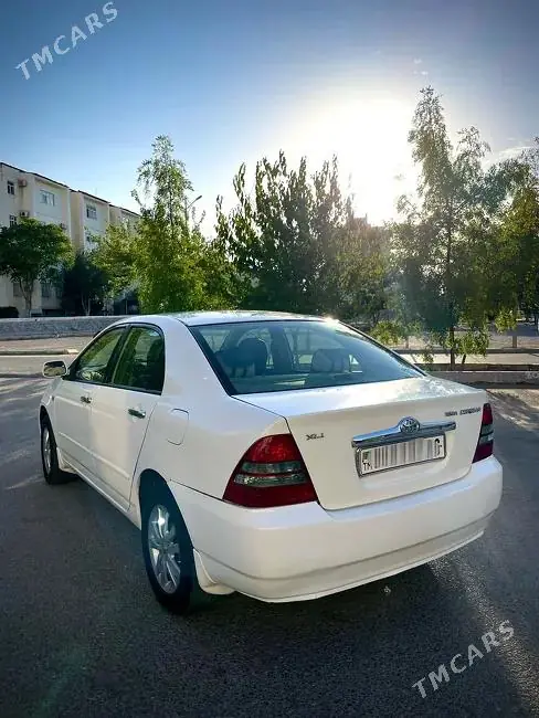 Toyota Corolla, 2004 — фото 4